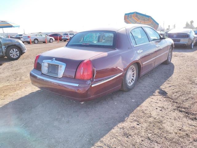 Photo 4 from auction – 2001 LINCOLN TOWN CAR C with VIN 1LNHM83W01Y650547