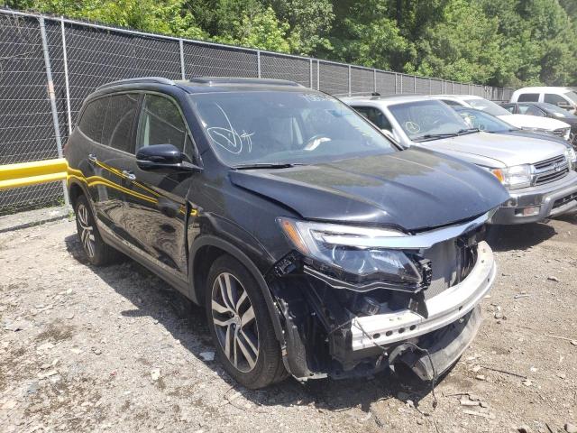HONDA PILOT ELIT 2016 with VIN 5FNYF6H09GB091838 - Photo from auction
