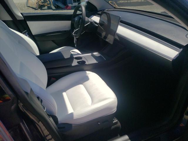 Photo 5 from auction – 2021 TESLA MODEL Y with VIN 5YJYGAEEXMF212730