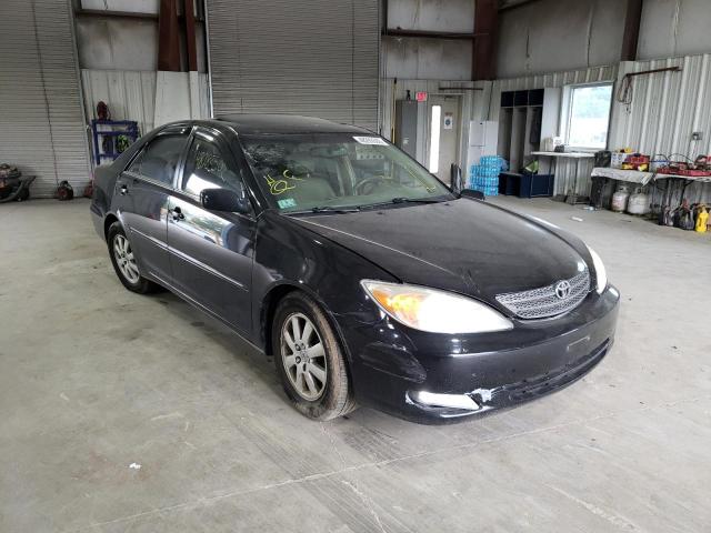 TOYOTA CAMRY LE 2003 with VIN 4T1BF30K03U051713 - Photo from auction