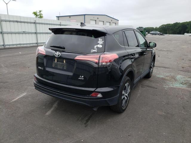 Photo 4 from auction – 2018 TOYOTA RAV4 LE with VIN 2T3BFREV5JW792871