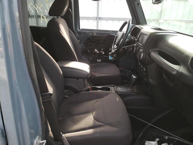 Photo 5 from auction – 2015 JEEP WRANGLER U with VIN 1C4BJWDG0FL551410