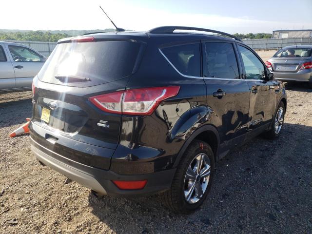Photo 4 from auction – 2015 FORD ESCAPE SE with VIN 1FMCU9G93FUC66829