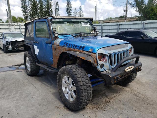 JEEP WRANGLER S 2015 with VIN 1C4AJWAG5FL669727 - Photo from auction