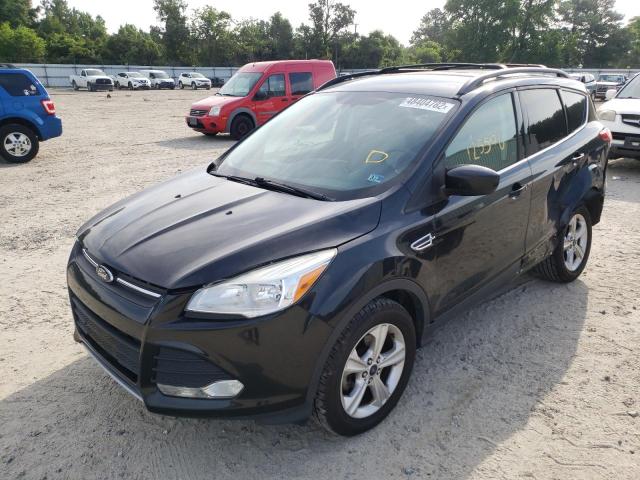 Photo 2 from auction – 2014 FORD ESCAPE SE with VIN 1FMCU0GX0EUB56619