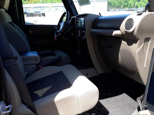 Photo 5 from auction – 2010 JEEP WRANGLER U with VIN 1J4BA5H15AL122525