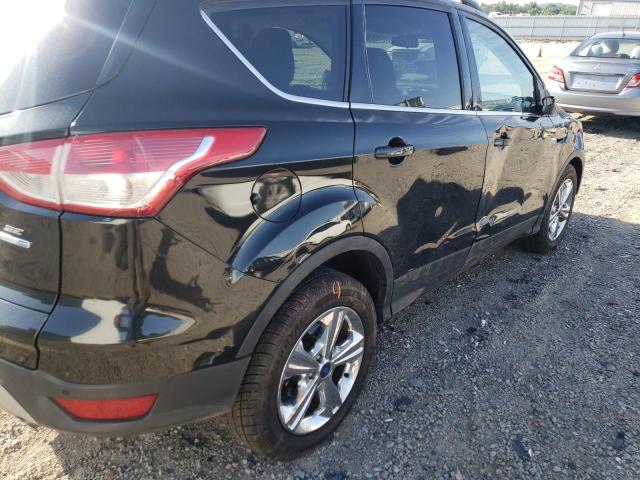 Photo 9 from auction – 2015 FORD ESCAPE SE with VIN 1FMCU9G93FUC66829