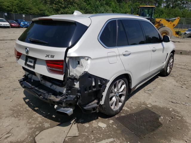 Photo 4 from auction – 2014 BMW X5 XDRIVE5 with VIN 5UXKR6C56E0C02049