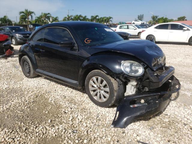 VOLKSWAGEN BEETLE 2013 with VIN 3VWFP7AT7DM636891 - Photo from auction