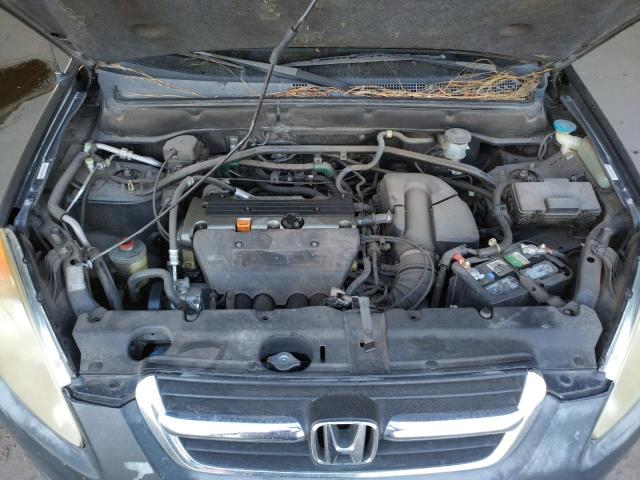 Photo 7 from auction – 2002 HONDA CR-V LX with VIN JHLRD68412C004195