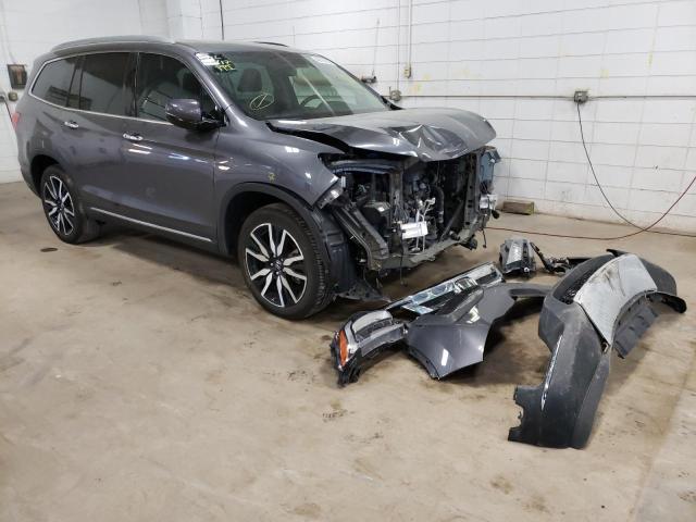 HONDA PILOT ELIT 2019 with VIN 5FNYF6H02KB000885 - Photo from auction