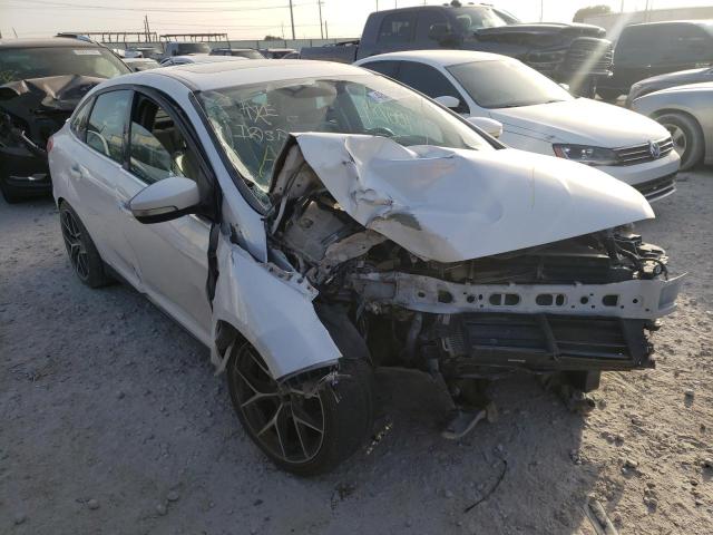 FORD FOCUS TITA 2016 with VIN 1FADP3J23GL241354 - Photo from auction