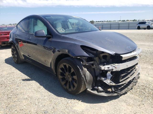 TESLA MODEL Y 2021 with VIN 5YJYGAEEXMF212730 - Photo from auction