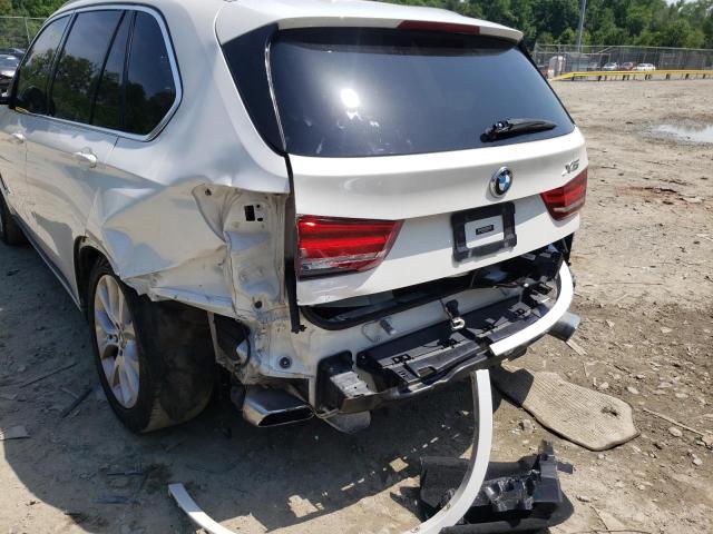 Photo 9 from auction – 2014 BMW X5 XDRIVE5 with VIN 5UXKR6C56E0C02049