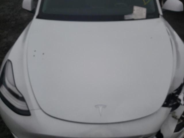 Photo 7 from auction – 2020 TESLA MODEL Y with VIN 5YJYGDEE8LF006581