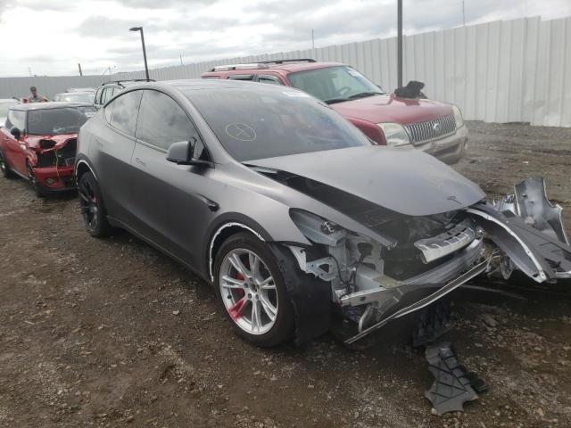 TESLA MODEL Y 2020 with VIN 5YJYGDEE3LF034045 - Photo from auction