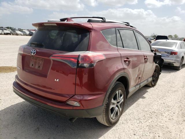 Photo 4 from auction – 2018 TOYOTA RAV4 LE with VIN JTMZFREV5JD112480