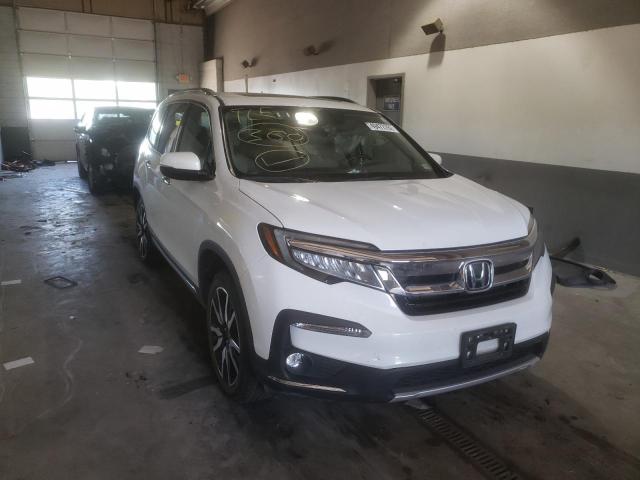 HONDA PILOT ELIT 2020 with VIN 5FNYF6H08LB028675 - Photo from auction