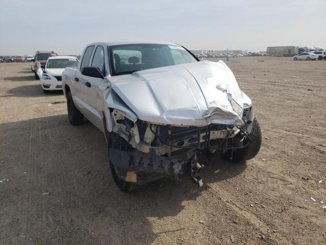 DODGE DAKOTA SLT 2011 with VIN 1D7RE3GKXBS521063 - Photo from auction