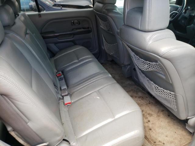 Foto 6 de la subasta – 2004 HONDA PILOT con VIN 2HKYF18764H603214