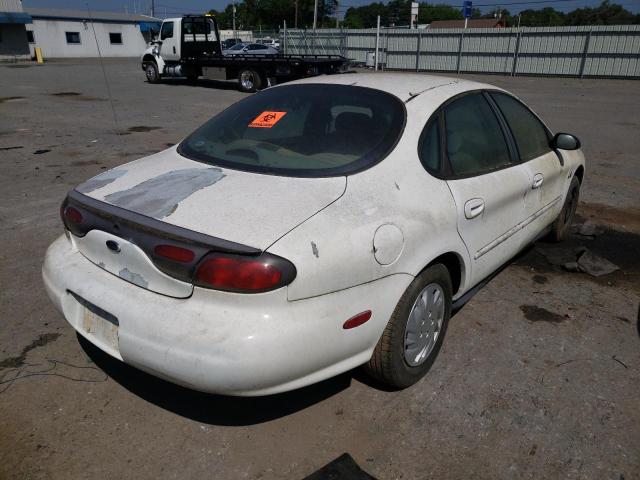 Photo 4 from auction – 1999 FORD TAURUS with VIN 1FAFP5221XG191856
