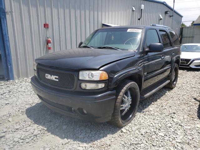 Photo 2 from auction – 2003 GMC YUKON with VIN 1GKEC13T93R138830