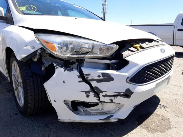 Photo 9 from auction – 2017 FORD FOCUS SE with VIN 1FADP3F24HL236142