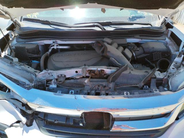 Photo 7 from auction – 2020 HONDA PILOT LX with VIN 5FNYF5H15LB007365