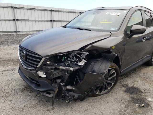 Photo 9 from auction – 2016 MAZDA CX-5 with VIN JM3KE4DY4G0761293