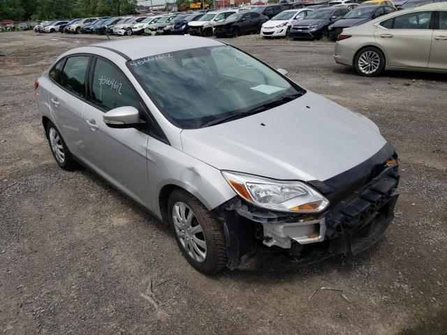 FORD FOCUS SE 2013 with VIN 1FADP3F22DL316338 - Photo from auction