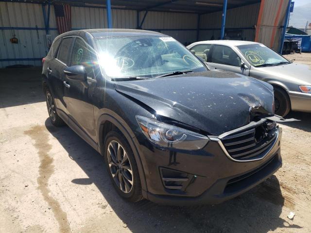 MAZDA CX-5 GT 2016 with VIN JM3KE4DY5G0667018 - Photo from auction