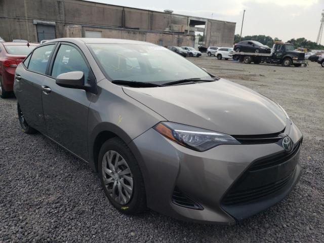 TOYOTA COROLLA 2017 with VIN 2T1BURHE1HC876935 - Photo from auction