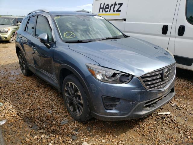 MAZDA CX-5 GT 2016 with VIN JM3KE2DY4G0669735 - Photo from auction