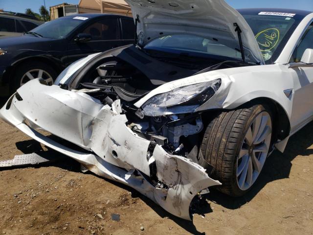 Photo 9 from auction – 2018 TESLA MODEL 3 with VIN 5YJ3E1EB9JF081890