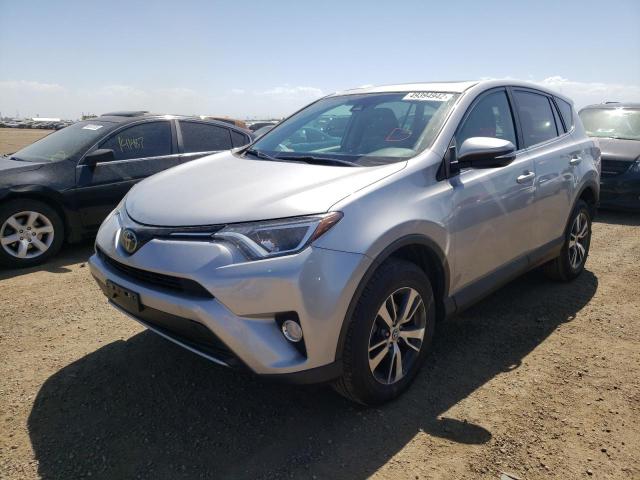 Photo 2 from auction – 2017 TOYOTA RAV4 XLE with VIN 2T3RFREV8HW658901