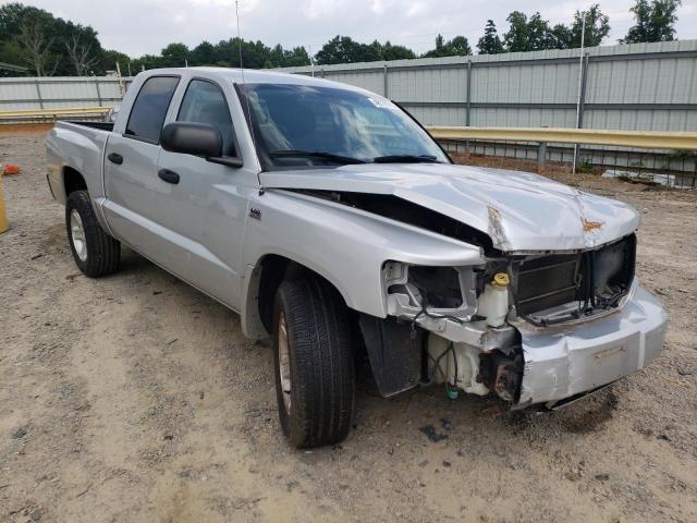 DODGE DAKOTA SLT 2011 with VIN 1D7RW3GP7BS695889 - Photo from auction