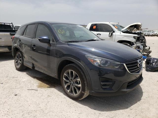 MAZDA CX-5 GT 2016 with VIN JM3KE2DY4G0875203 - Photo from auction