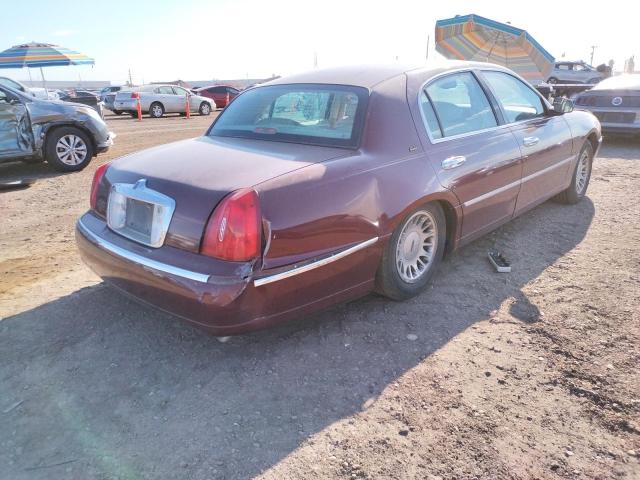 Photo 9 from auction – 2001 LINCOLN TOWN CAR C with VIN 1LNHM83W01Y650547