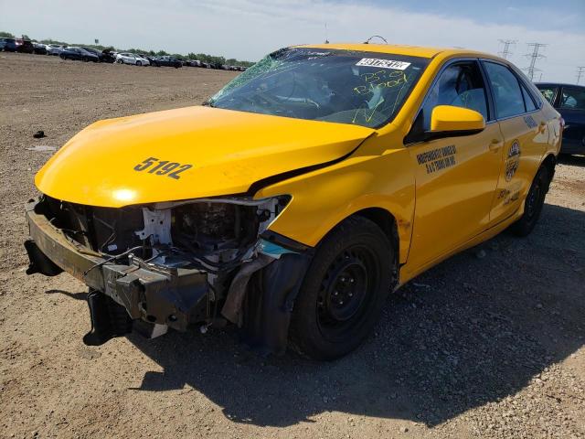 Photo 2 from auction – 2016 TOYOTA CAMRY HYBR with VIN 4T1BD1FK9GU200529
