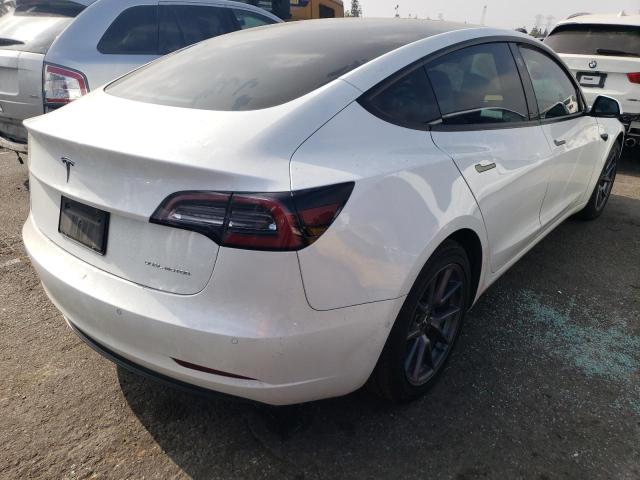 Photo 4 from auction – 2021 TESLA MODEL 3 with VIN 5YJ3E1EB5MF927016