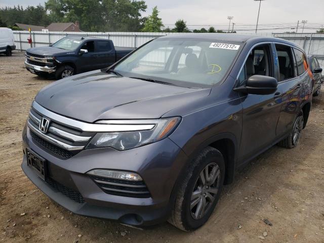 Photo 2 from auction – 2018 HONDA PILOT LX with VIN 5FNYF5H14JB014773