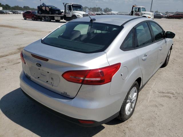 Photo 4 from auction – 2016 FORD FOCUS SE with VIN 1FADP3F21GL294109