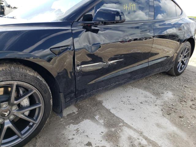 Photo 9 from auction – 2022 TESLA MODEL 3 with VIN 5YJ3E1EB8NF152387