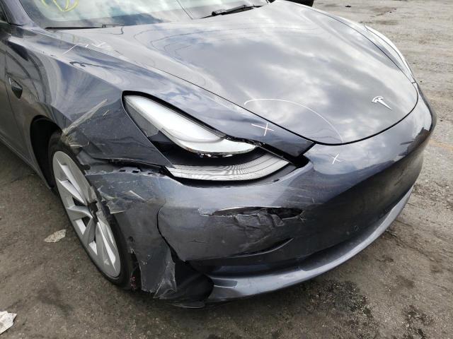 Photo 9 from auction – 2022 TESLA MODEL 3 with VIN 5YJ3E1EAXNF144556