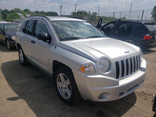 JEEP COMPASS SP 2009 with VIN 1J8FF47B19D107287 - Photo from auction