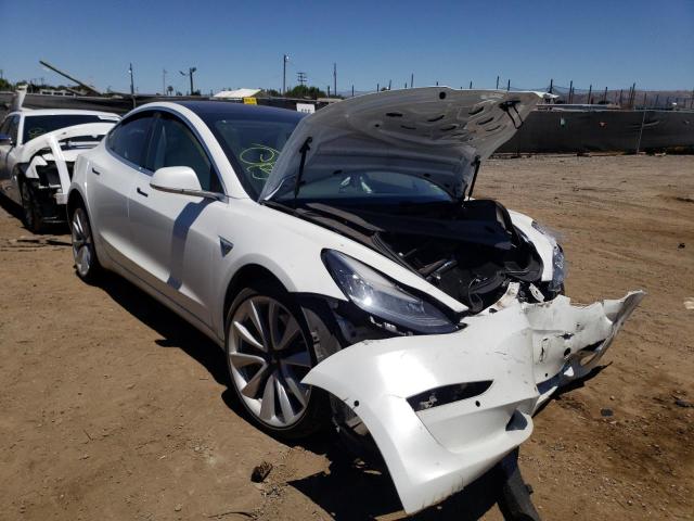 TESLA MODEL 3 2018 with VIN 5YJ3E1EB9JF081890 - Photo from auction