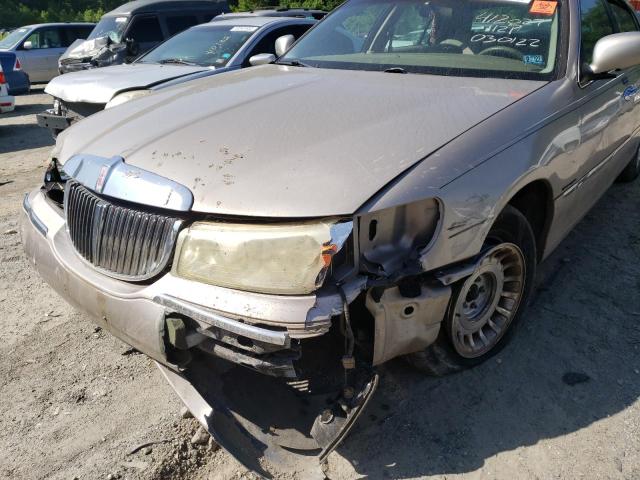Photo 9 from auction – 2000 LINCOLN TOWN CAR E with VIN 1LNHM81W5YY924306