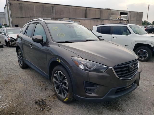 MAZDA CX-5 2016 with VIN JM3KE4DY4G0761293 - Photo from auction