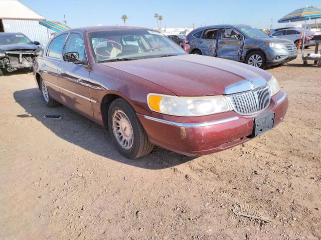 LINCOLN TOWN CAR C 2001 with VIN 1LNHM83W01Y650547 - Photo from auction