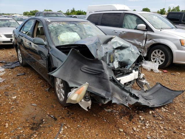 TOYOTA CAMRY LE 2002 with VIN 4T1BE32K32U586999 - Photo from auction
